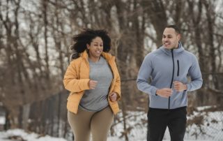 winter exercise photo by Julia Larson - man and woman running