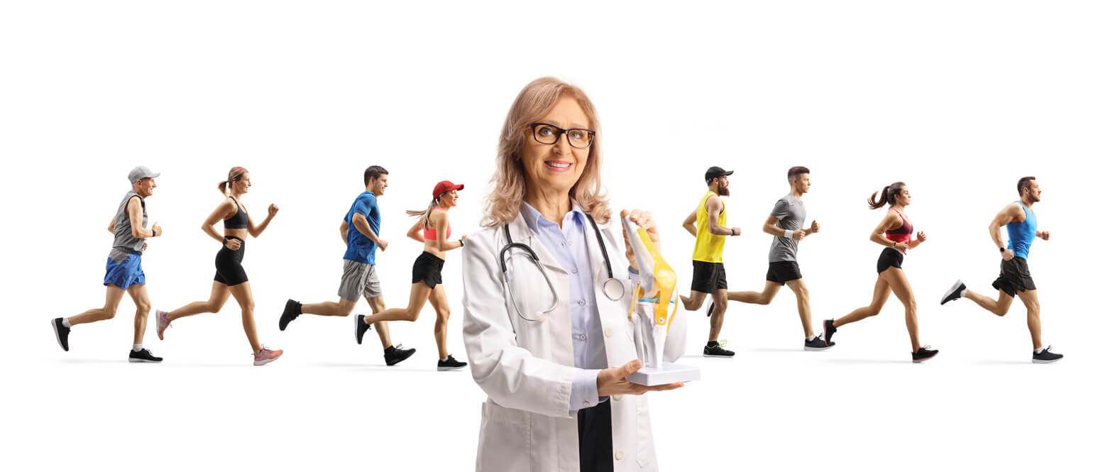 Female sport medicine doctor showing a knee bone model in front of people running